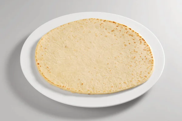 Round dish with piadina bread — Stock Photo, Image