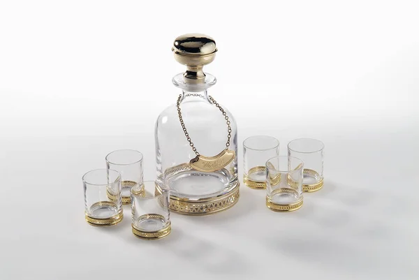 Elegant vodka set with golden decorations — Stock Photo, Image