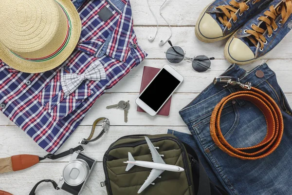 Top view accessories to travel with man clothing concept. shirt, — Stock Photo, Image