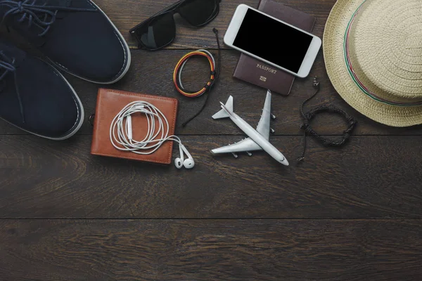 Table top view of essential item gentlemen for travel with technology background concept. — Stock Photo, Image