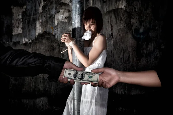 Human trafficking concept., Person hand with a dollar banknote b — Stock Photo, Image