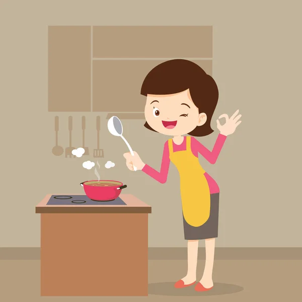 Woman cooking showing ok sign — Stock Vector