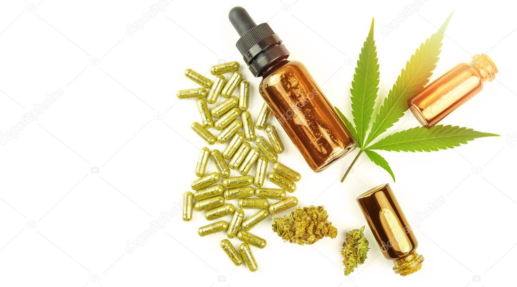 Full spectrum CBD oils, flower buds and pills flat lay isolated