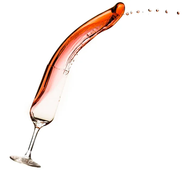 Vin som rinner ur ett glas — Stockfoto