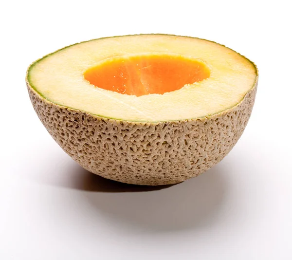 Eine halbe geschnittene Cantaloupe — Stockfoto