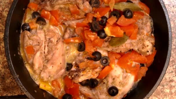 Rabbit Cacciatore Cooking in Cast Iron Pan on Stovetop Overhead View — 비디오