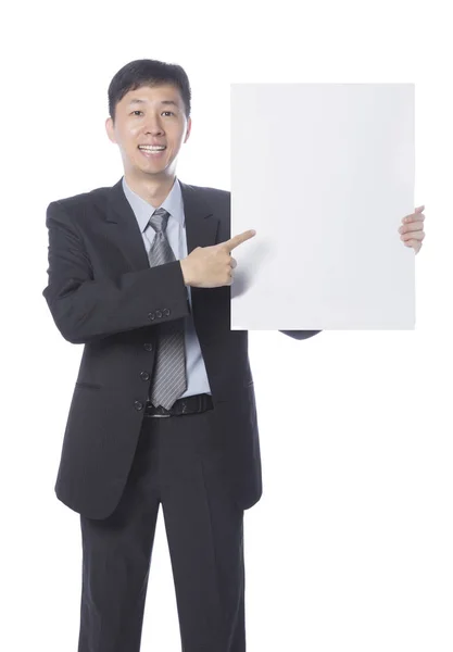 Businessman holding empty board — Stock Photo, Image