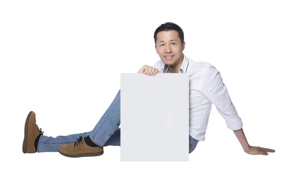 Homem mostrando um grande quadro branco — Fotografia de Stock