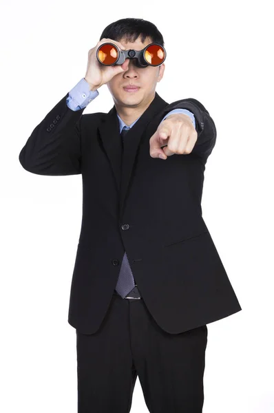 Empresário asiático com binóculos — Fotografia de Stock