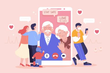 Genç bir aile akıllı telefondan büyükannesi ve büyükbabasıyla görüntülü konuşma yapıyor ve ikisi de sevdikleri için en iyisini diliyorlar.
