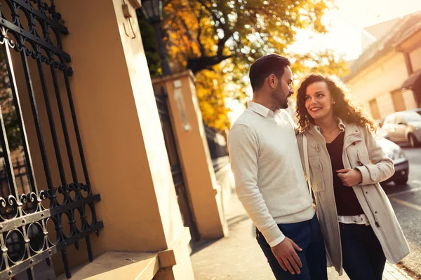 Beautiful couple walking outdoors — Stock Photo, Image