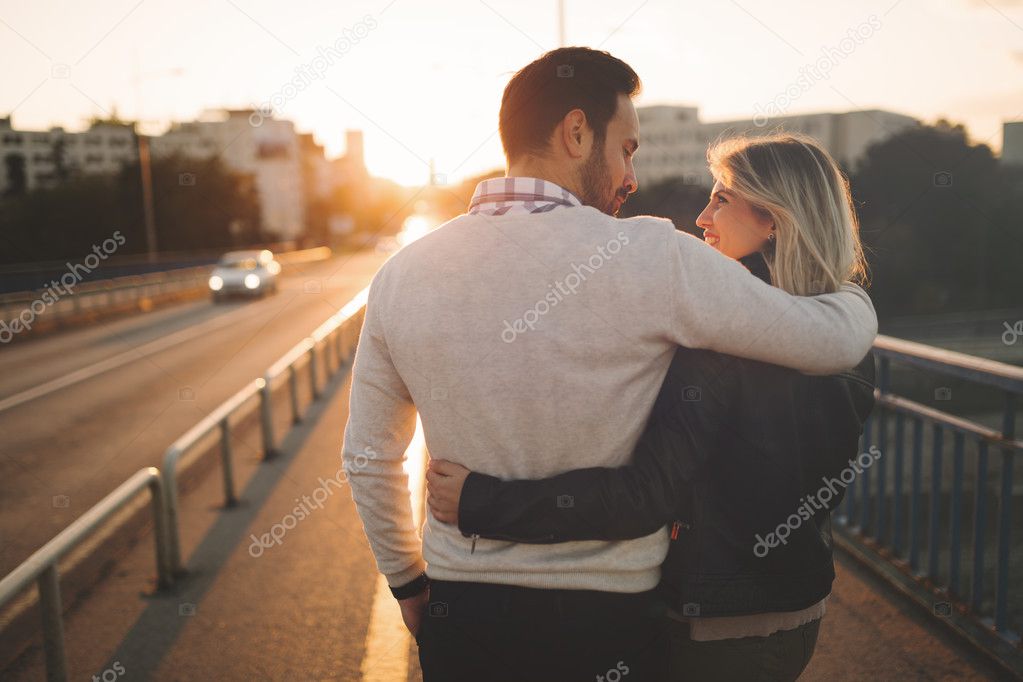 Happy tourist couple in love traveling