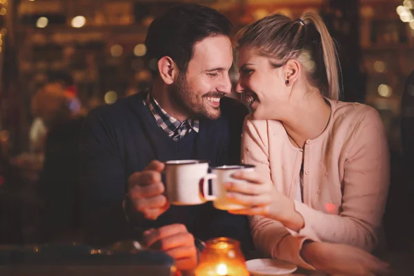 Romantic couple dating in pub — Stock Photo, Image
