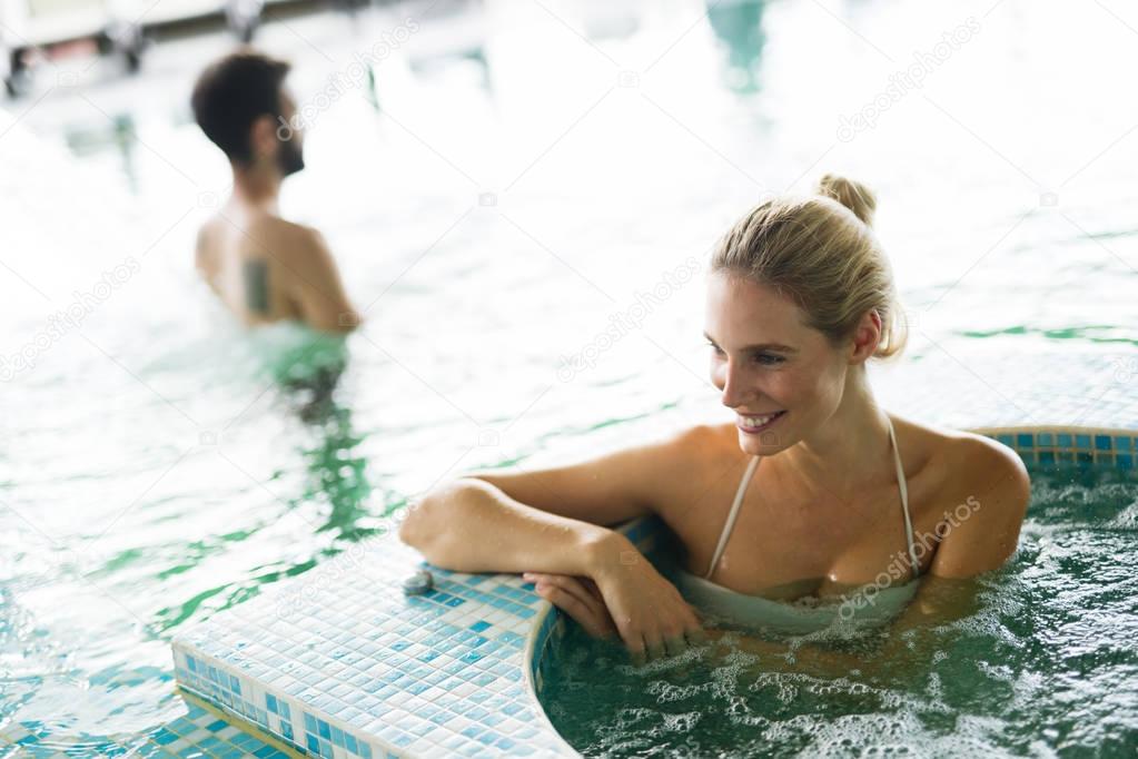 Beautiful woman in spa pool