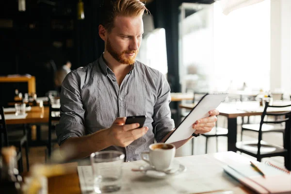 Businessman constantly working — Stock Photo, Image