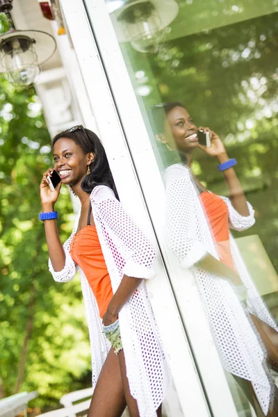 black woman talking on phone