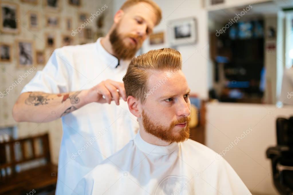 Male receiving hair beard treatment