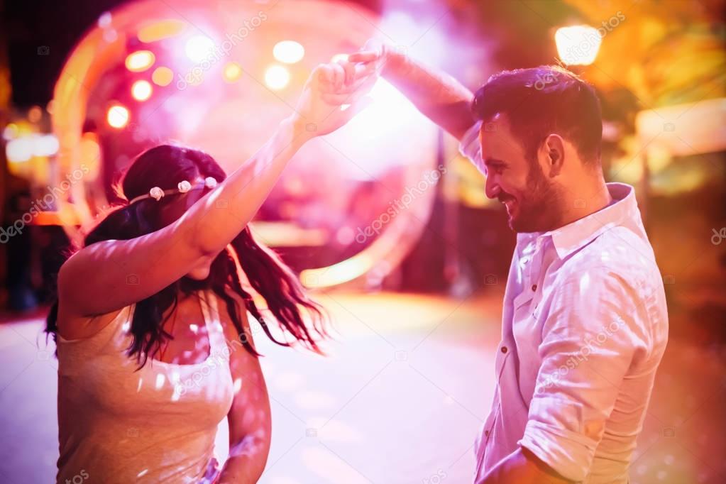 Couple dancing in club