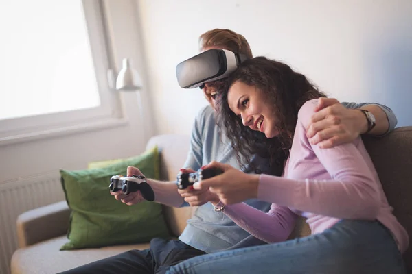 Couple playing games and loving VR