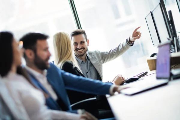 Software engineers working in office on project together — Stock Photo, Image