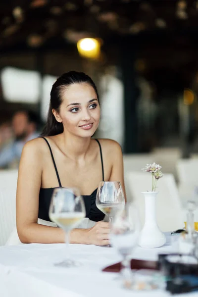 Attractive woman in restaurant — Stock Photo, Image