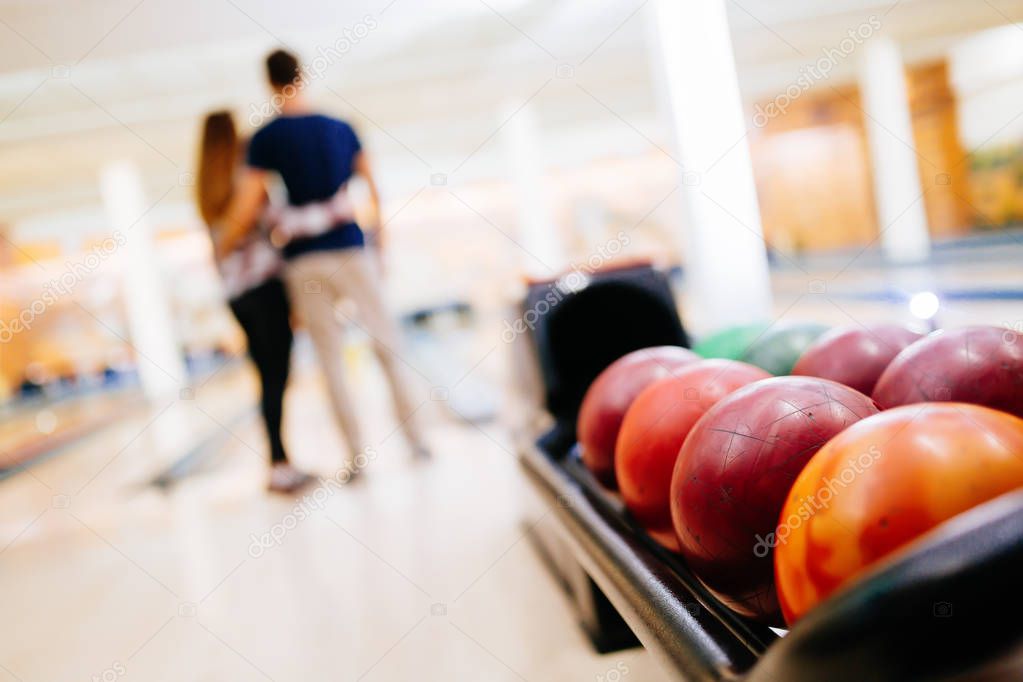 Couple enjoy bowling together