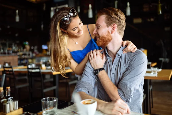 Beautiful man and woman flirt — Stock Photo, Image