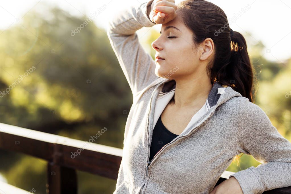 Fatigued woman taking break