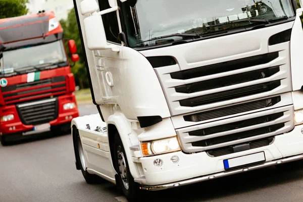 Trucks on road in row — Stock Photo, Image