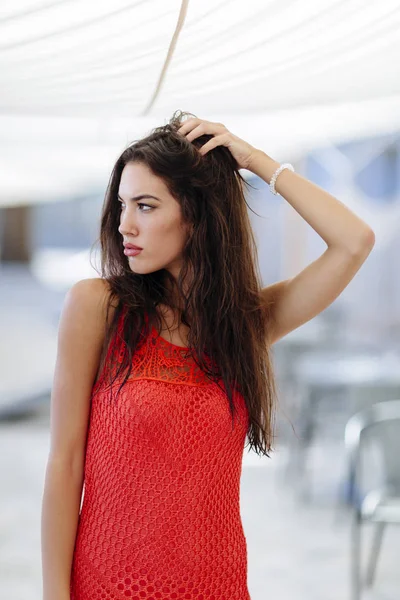 Woman posing in red dress — Stock Photo, Image
