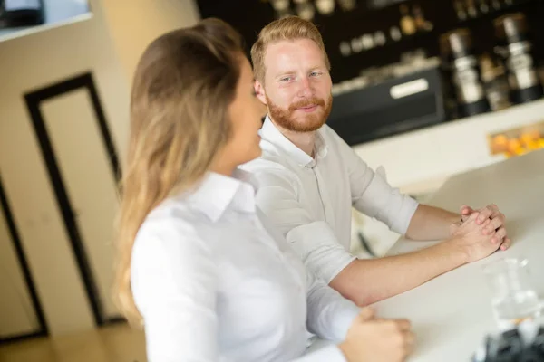 Business people flirting in cafe — Stock Photo, Image