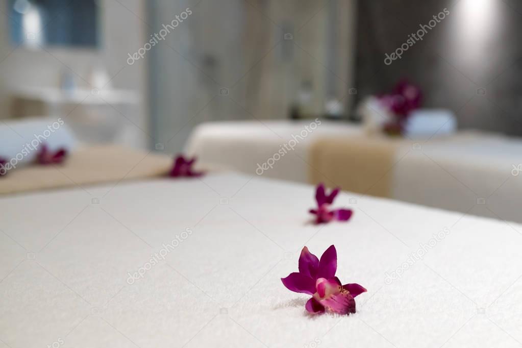 Flowers decorating massage beds