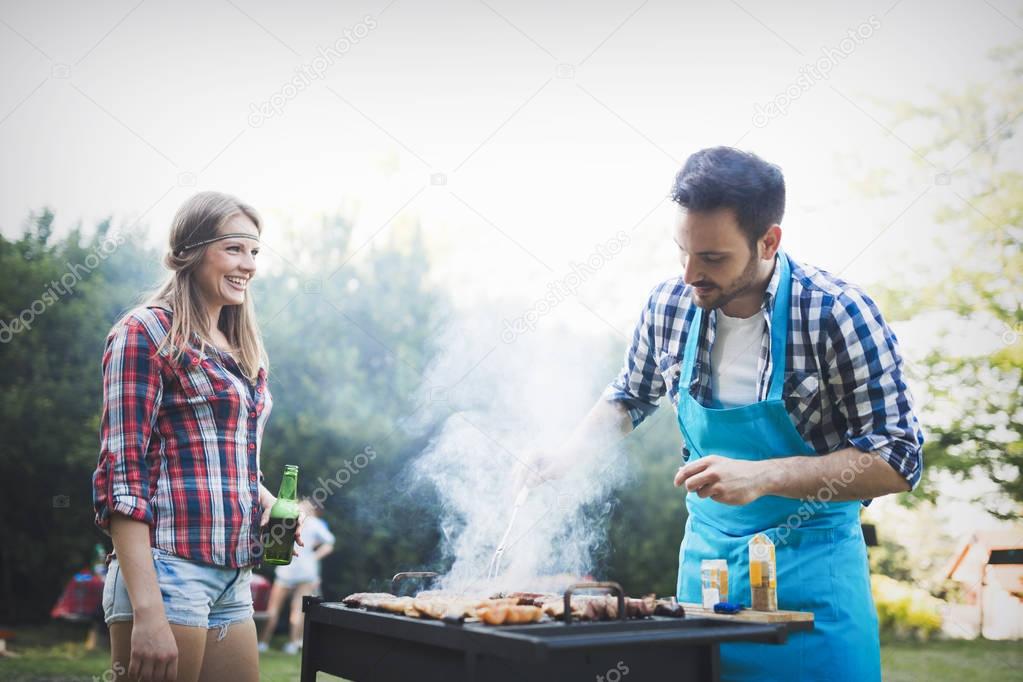 Friends enjoying bbq party 