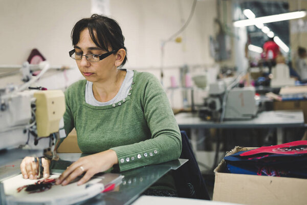 Работник текстильной промышленности
