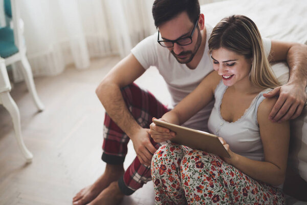 Couple in love using tablet