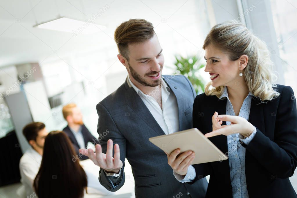 business people cooperating in company office