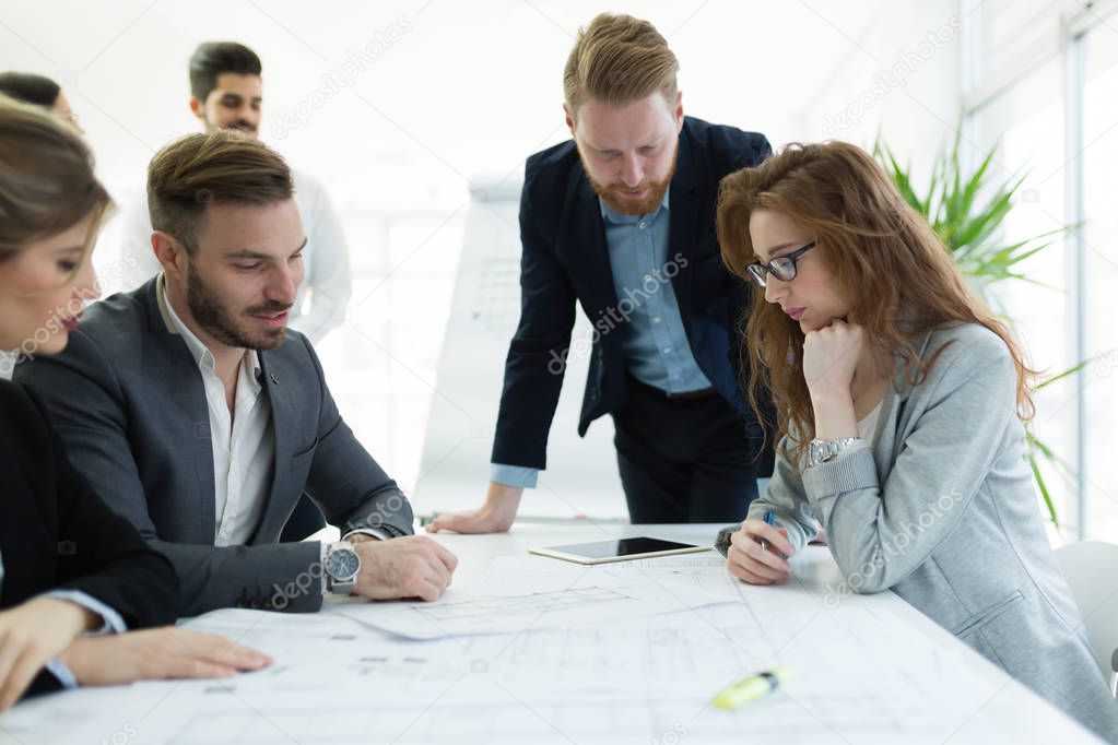 Group of architects working on project
