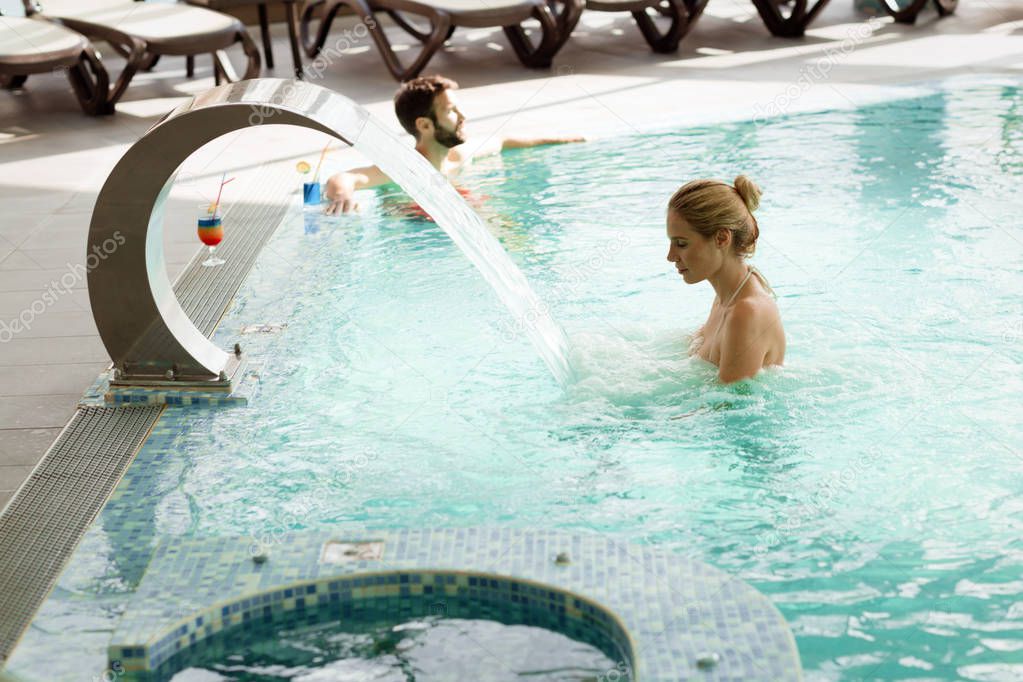 woman enjoying jet of water