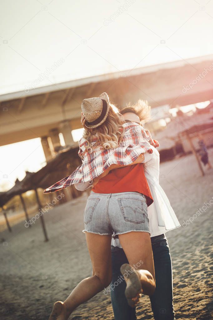 couple in love having fun at beach