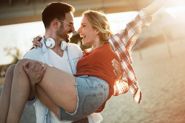 couple in love having fun at beach