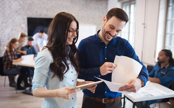 Company employees working in office