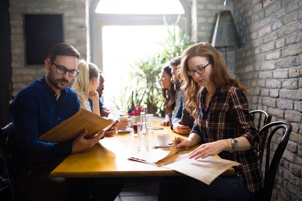 Happy colleagues in restaurant — Stock Photo, Image