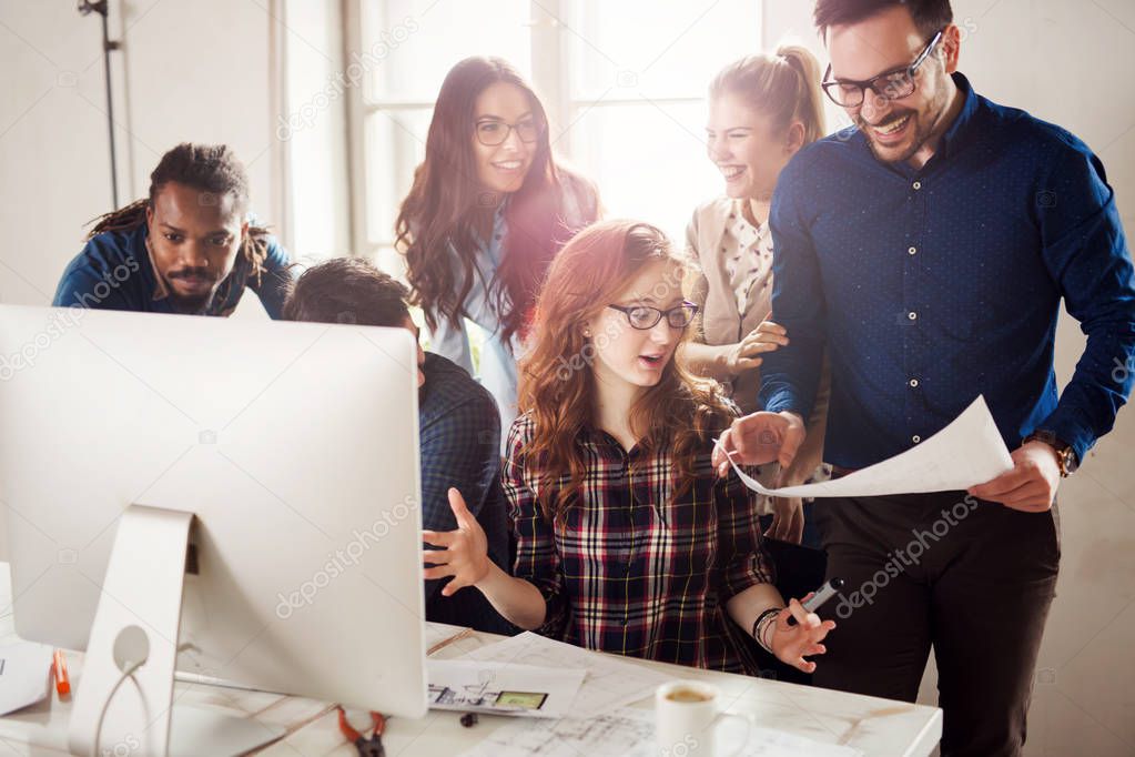 Company employees working in office