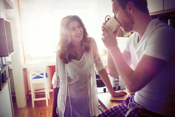 Romantic couple in love in kitchen — Stock Photo, Image