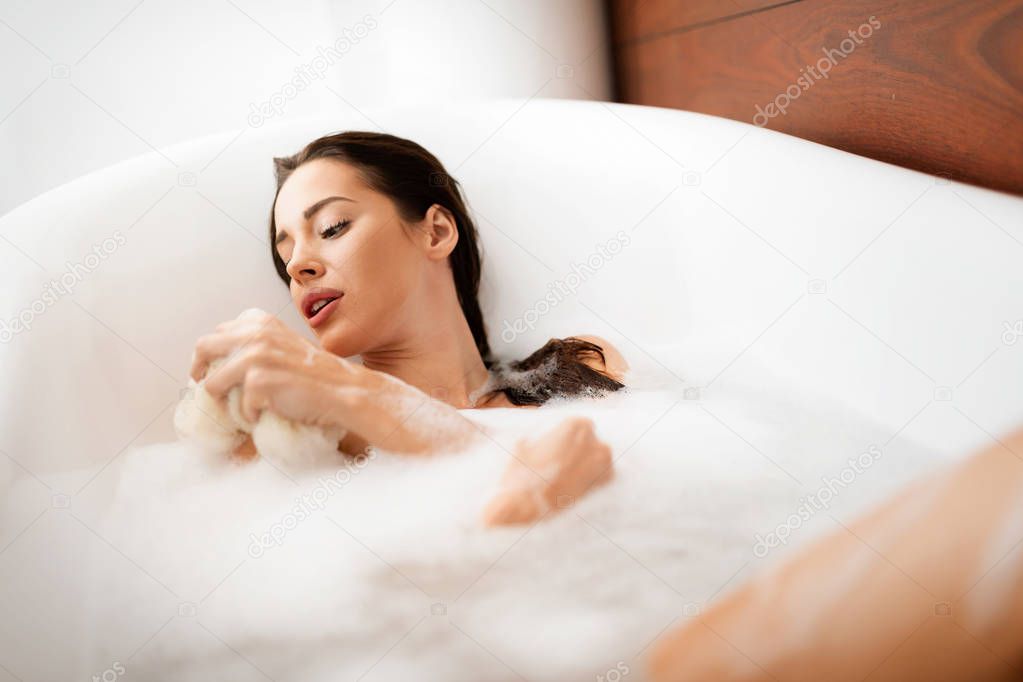 Beautiful woman in bathtub