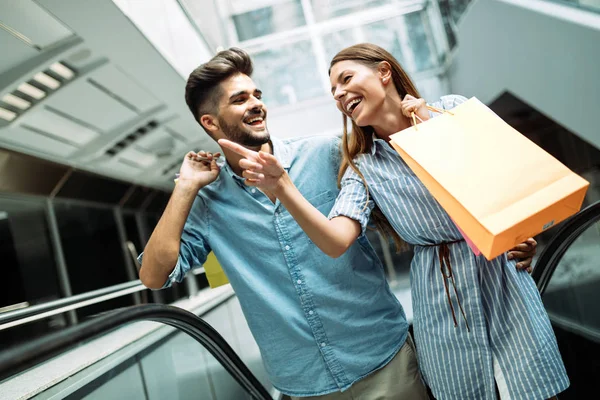 Happy attractive loving couple enjoy shopping together — Stock Photo, Image