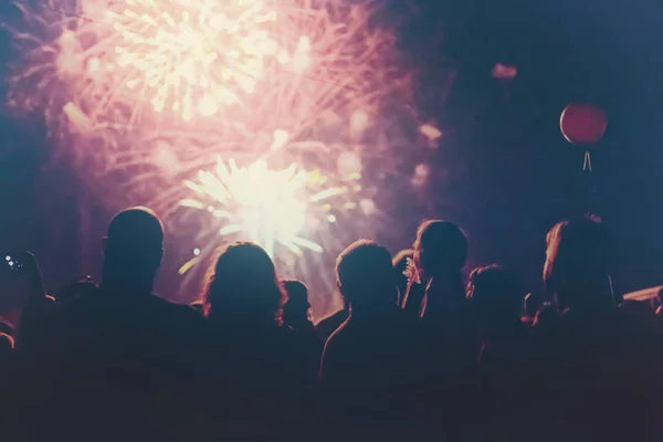 Crowd watching fireworks — Stock Photo, Image