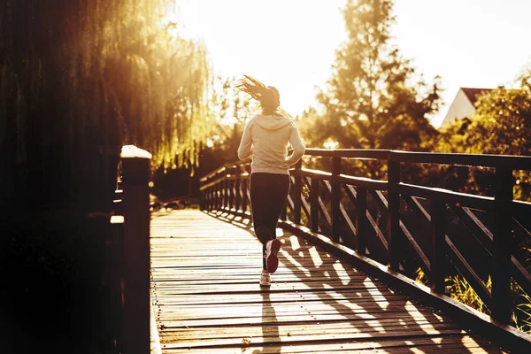 Beautiful female runner — Stock Photo, Image