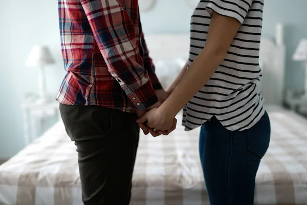 Portrait of man and woman in bedroom — Stock Photo, Image