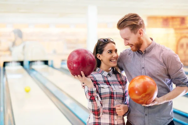 Couple enjoying bowling together